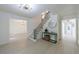 Inviting foyer with staircase, hardwood floors, and natural lighting at 1348 Timberland Se Dr, Marietta, GA 30067