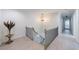 Upstairs hallway with railing at 1348 Timberland Se Dr, Marietta, GA 30067