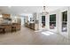 Spacious kitchen features a large island, stainless appliances, and a sun-drenched dining area at 1348 Timberland Se Dr, Marietta, GA 30067