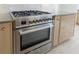 Close-up of a professional-grade stainless steel range with cooktop and oven at 1348 Timberland Se Dr, Marietta, GA 30067