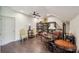 Home office with hardwood floors, a ceiling fan, and a vintage-style desk at 306 Nottaway Ln, Alpharetta, GA 30009