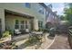 Outdoor patio with wrought-iron furniture, a grill, and views of the home at 306 Nottaway Ln, Alpharetta, GA 30009