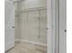 Walk-in closet with white wire shelving and modern doors at 6022 Fieldcrest Dr, Morrow, GA 30260