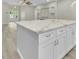 Close up of kitchen island featuring marble countertops and stainless steel hardware at 6022 Fieldcrest Dr, Morrow, GA 30260