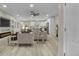 Open-concept living space with recessed lighting, ceiling fan, built-in shelves, and an electric fireplace at 6022 Fieldcrest Dr, Morrow, GA 30260