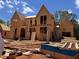 New construction home showing framing and wooden building materials at 6740 Pannell Rd, Buford, GA 30518
