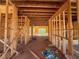 Open floor plan framing in home construction with exposed wood beams at 6740 Pannell Rd, Buford, GA 30518
