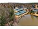 Beautiful view of community tennis courts, pool, and lake access creating a desirable lifestyle at 10410 High Falls Cir, Alpharetta, GA 30022