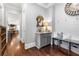 Stylish entryway with a built-in bench, shiplap accents, and decorative mirror at 12980 Overlook Pass, Roswell, GA 30075