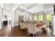 Spacious living room with hardwood floors, coffered ceiling, and a cozy atmosphere at 12980 Overlook Pass, Roswell, GA 30075