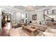 Comfortable living room with coffered ceiling, plush seating, and stylish decor at 12980 Overlook Pass, Roswell, GA 30075