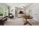 Spacious living room with neutral decor, comfortable seating, and an open layout perfect for gatherings at 12980 Overlook Pass, Roswell, GA 30075