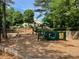 Community playground with lots of equipment for the to enjoy at 12980 Overlook Pass, Roswell, GA 30075