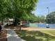 Community tennis court and picnic pavilion for enjoying outdoor time at 12980 Overlook Pass, Roswell, GA 30075