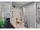 Clean bathroom featuring a shower with a curtain and functional storage at 1429 Smithson Dr, Lithonia, GA 30058