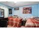 Bedroom featuring two twin beds, a dresser and light blue walls at 1429 Smithson Dr, Lithonia, GA 30058