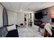 Cozy living room area with a comfortable couch, TV and electric fireplace at 1429 Smithson Dr, Lithonia, GA 30058