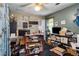 An office featuring a computer, desk, bookcase, boxes and decor at 1429 Smithson Dr, Lithonia, GA 30058