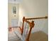 Bright foyer with hardwood floors and staircase leading to the upper level at 4942 Brown Leaf Dr, Powder Springs, GA 30127