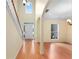 Inviting foyer featuring hardwood floors, staircase, and arched doorways, providing a bright and open entrance at 4942 Brown Leaf Dr, Powder Springs, GA 30127