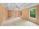 Spacious bedroom boasts tray ceilings, natural light and ensuite bathroom at 4942 Brown Leaf Dr, Powder Springs, GA 30127