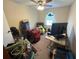 Small bedroom filled with personal items and clutter at 135 Governors Rdg, Auburn, GA 30011