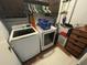 Efficient laundry room featuring a modern washer and dryer, and providing practical space for household tasks at 135 Governors Rdg, Auburn, GA 30011