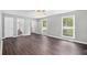 Bright, open-concept living room featuring hardwood floors and large windows at 2722 Springside Ct, Douglasville, GA 30135
