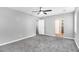 Large carpeted main bedroom featuring lots of open space and bright natural light at 2722 Springside Ct, Douglasville, GA 30135