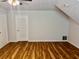The bedroom has hardwood floors, natural lighting and a closet at 3988 Chimney Ridge Dr, Ellenwood, GA 30294