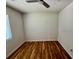 Bedroom with hardwood floors and a ceiling fan offers comfort and style for a relaxing retreat at 3988 Chimney Ridge Dr, Ellenwood, GA 30294
