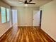 Bedroom with hardwood floors and a ceiling fan offers comfort and style for a peaceful retreat at 3988 Chimney Ridge Dr, Ellenwood, GA 30294
