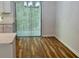 Charming dining area featuring hardwood floors and natural lighting at 3988 Chimney Ridge Dr, Ellenwood, GA 30294
