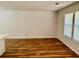 Bright living room with hardwood floors and large windows for natural light at 3988 Chimney Ridge Dr, Ellenwood, GA 30294