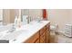 Well-lit bathroom featuring a double vanity and modern fixtures at 988 Treymont Way, Lawrenceville, GA 30045