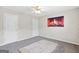 Bedroom features a decorative rug, neutral walls, carpet floors and two closets at 988 Treymont Way, Lawrenceville, GA 30045