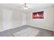 Spacious bedroom featuring soft carpeting, ample natural light, and two entry doorways at 988 Treymont Way, Lawrenceville, GA 30045