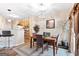 Bright dining room features a modern chandelier, hardwood floors and bar seating at 988 Treymont Way, Lawrenceville, GA 30045