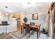 Inviting dining area featuring a wooden table, elegant lighting, and stylish decor accents at 988 Treymont Way, Lawrenceville, GA 30045