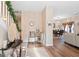Inviting foyer with hardwood floors and view into dining and living areas at 988 Treymont Way, Lawrenceville, GA 30045