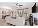 Comfortable living room area adjacent to the dining room, showcasing wood floors and neutral paint at 988 Treymont Way, Lawrenceville, GA 30045