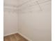 Walk-in closet showcasing wire shelving for organized storage at 1015 Lakeside Cir, Covington, GA 30016