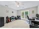 Bedroom suitable for use as a home office or studio with a ceiling fan at 130 Lacey Oak Ln, Loganville, GA 30052