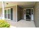 Home exterior featuring front door with glass and a decorative welcome wreath at 130 Lacey Oak Ln, Loganville, GA 30052