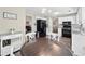 An open-concept kitchen flows into a dining area with view to the living room at 130 Lacey Oak Ln, Loganville, GA 30052