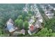 Aerial view of a lovely home located in a well-manicured community on a cloudy day at 3265 Watson Gate Rd, Loganville, GA 30052