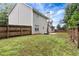 The vast backyard comes complete with a private fence and ample room for outdoor activities at 3265 Watson Gate Rd, Loganville, GA 30052