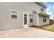 A private backyard with a door leading into the house and a grass area at 3265 Watson Gate Rd, Loganville, GA 30052