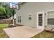 Backyard patio with basketball hoop and a backyard entrance to the home at 3265 Watson Gate Rd, Loganville, GA 30052