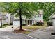 Charming two-story home with a two-car garage, landscaped front yard, and a combination of siding and stone exterior at 3265 Watson Gate Rd, Loganville, GA 30052
